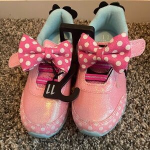 Size 11 Minnie Mouse shoes.